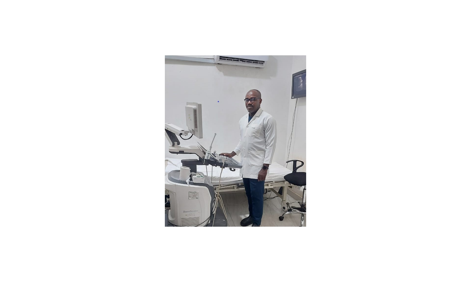 Radiologist with ultrasound imaging equipment